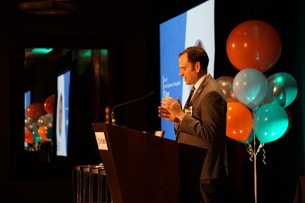 Our Director, Sam Zimbabwe, giving the keynote address at the CTR Champions Breakfast on June 5.