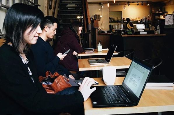 People working at a café