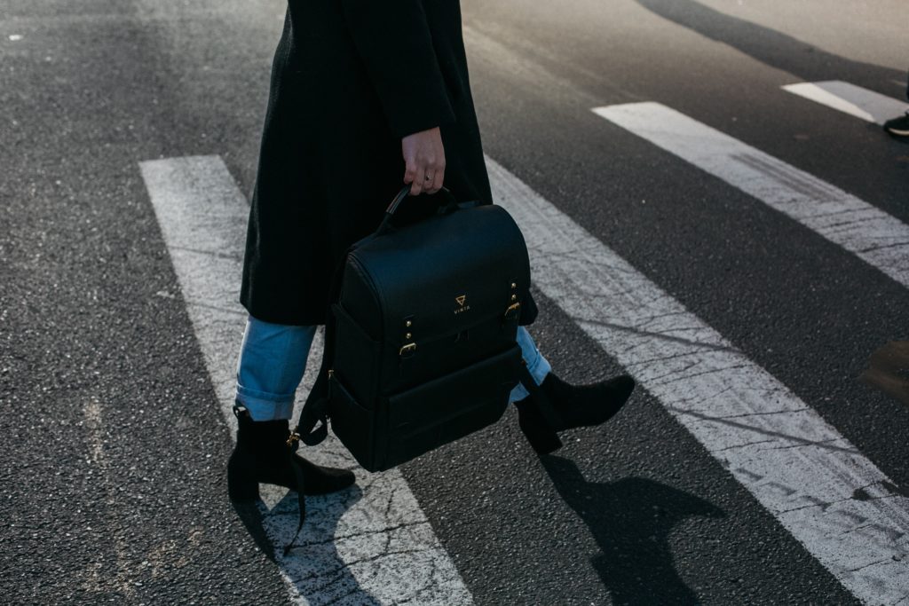 A person crossing a crosswalk