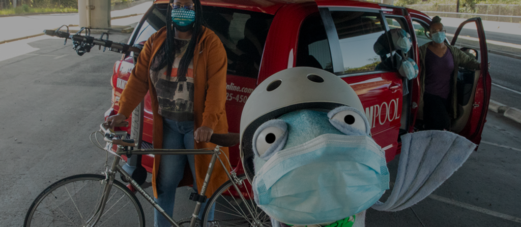 Commuters in Seattle share a Vanpool. They are pictured with bikes which are transported on the bike rack of the van.